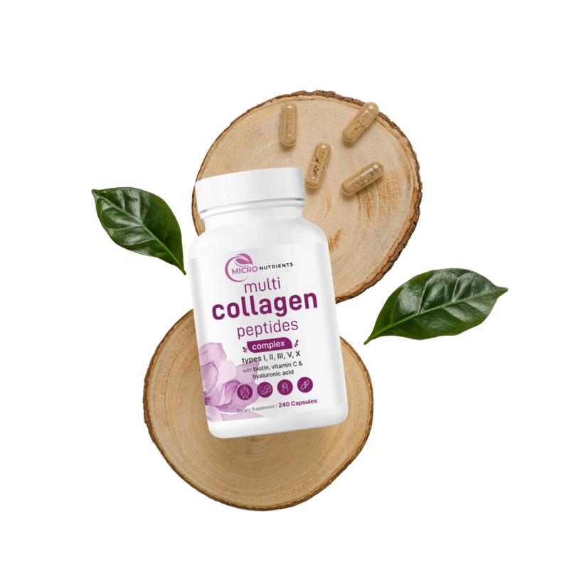 Multi collagen peptides supplement bottle on a wooden surface with leaves