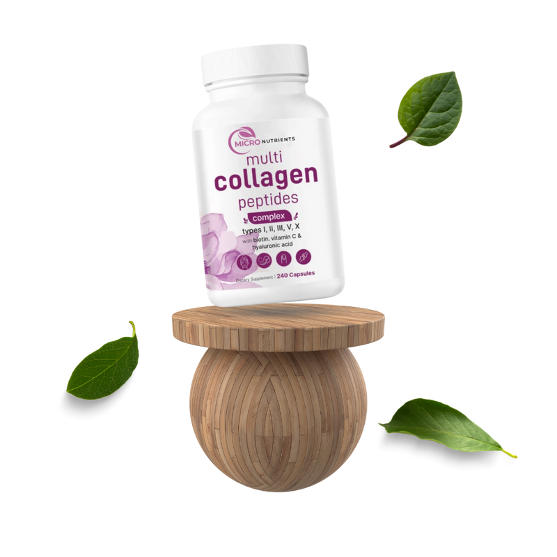 Multicollagen peptides supplement bottle on a wooden stand with leaves around on a white background