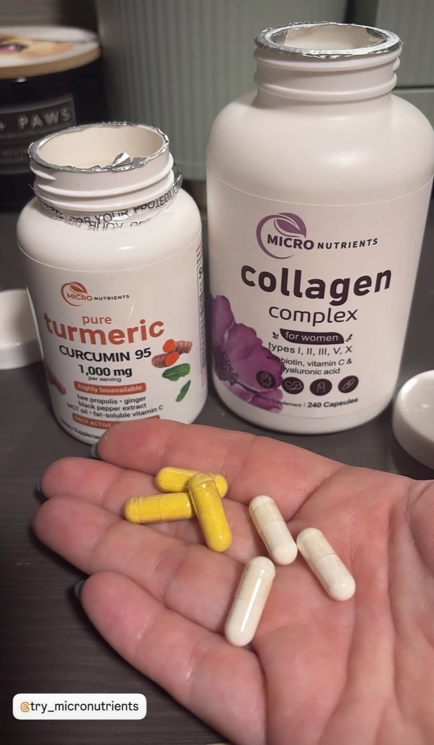 Supplement bottles labeled 'pure turmeric' and 'collagen complex' with pills on a hand.