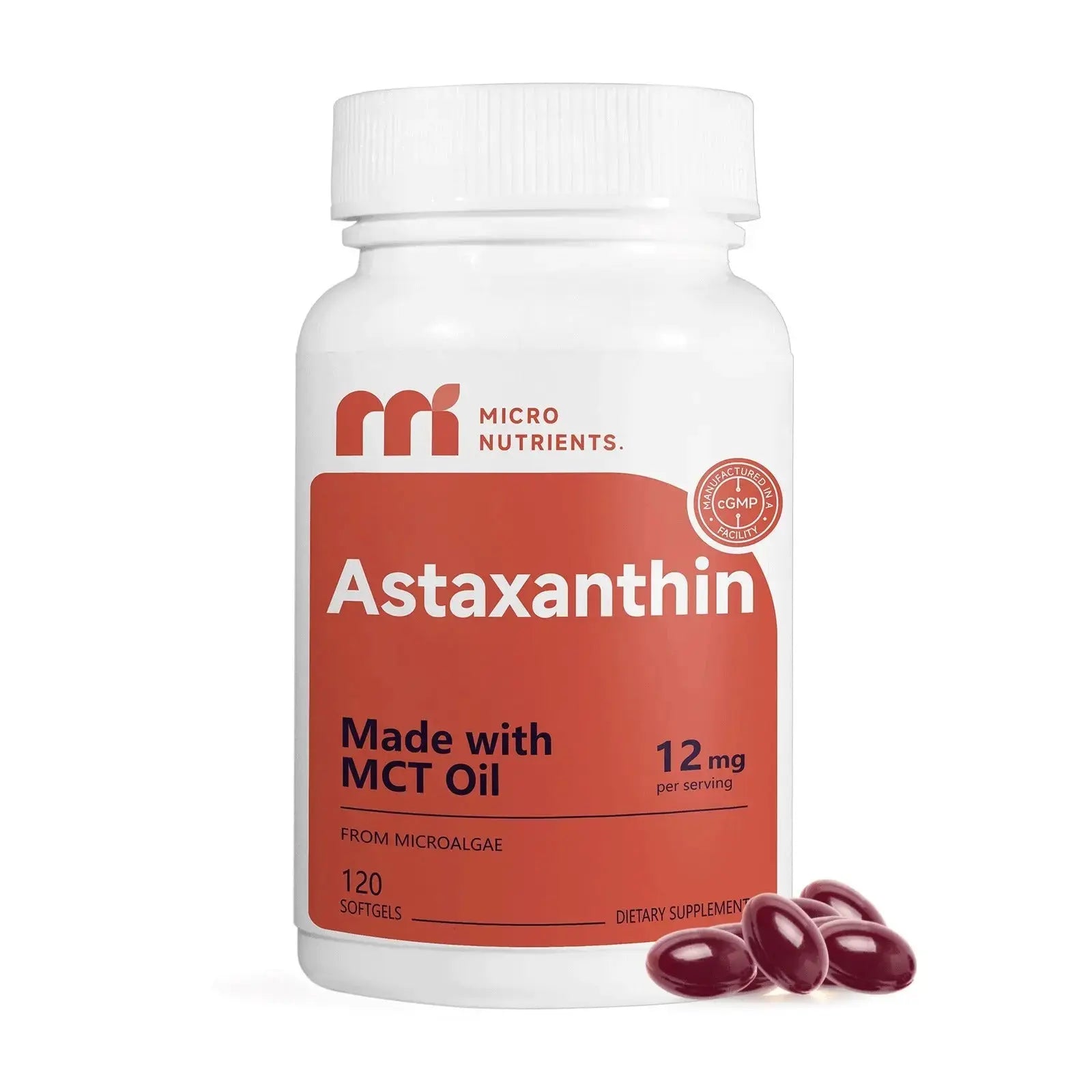 Supplement bottle labeled 'Astaxanthin' with MCT oil on a white background