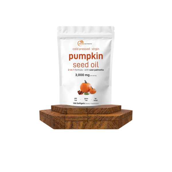 Bag of pumpkin seed oil on a wooden stand with a white background