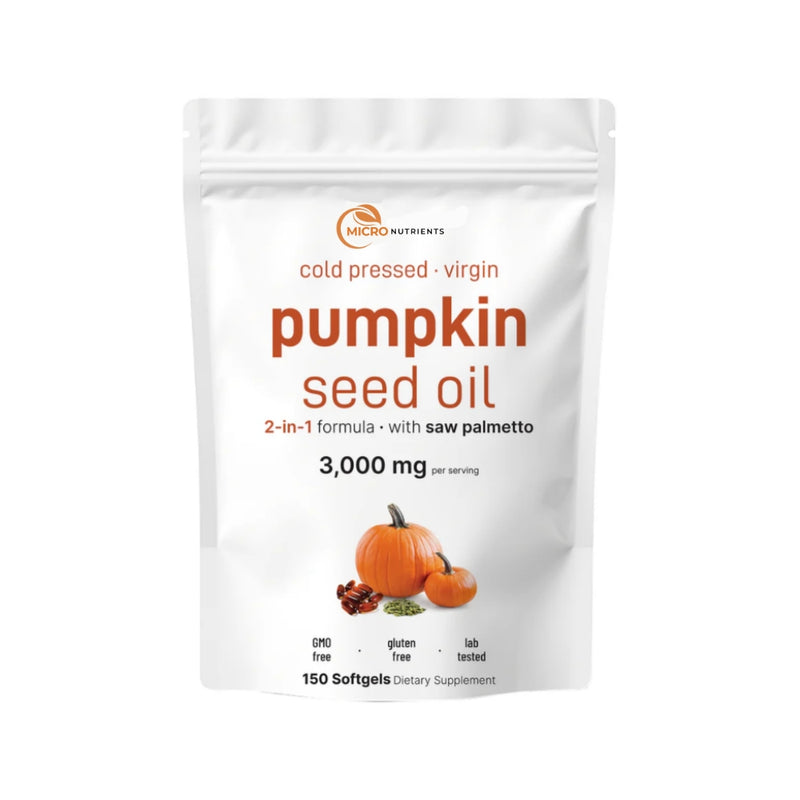 Package of pumpkin seed oil with pumpkins and nuts on a white background