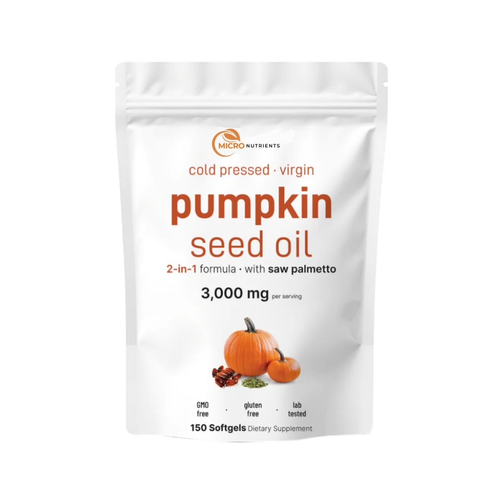 Package of pumpkin seed oil with pumpkins and nuts on a white background
