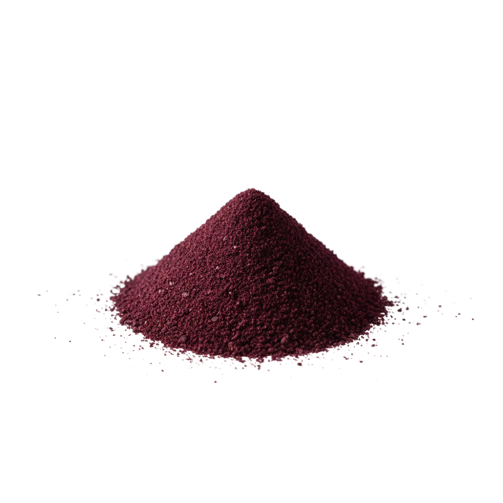 Pile of dark red powder on a white background