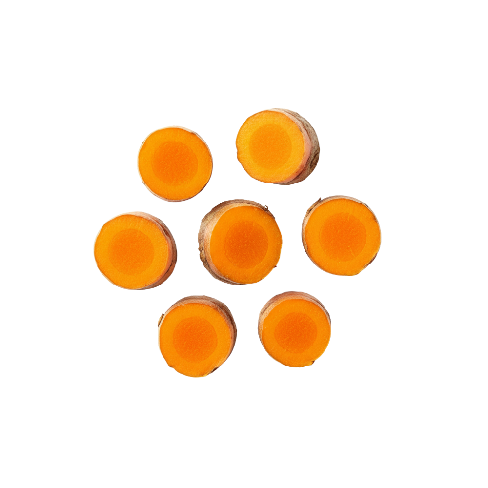 Sliced turmeric arranged in a circular pattern on a white background