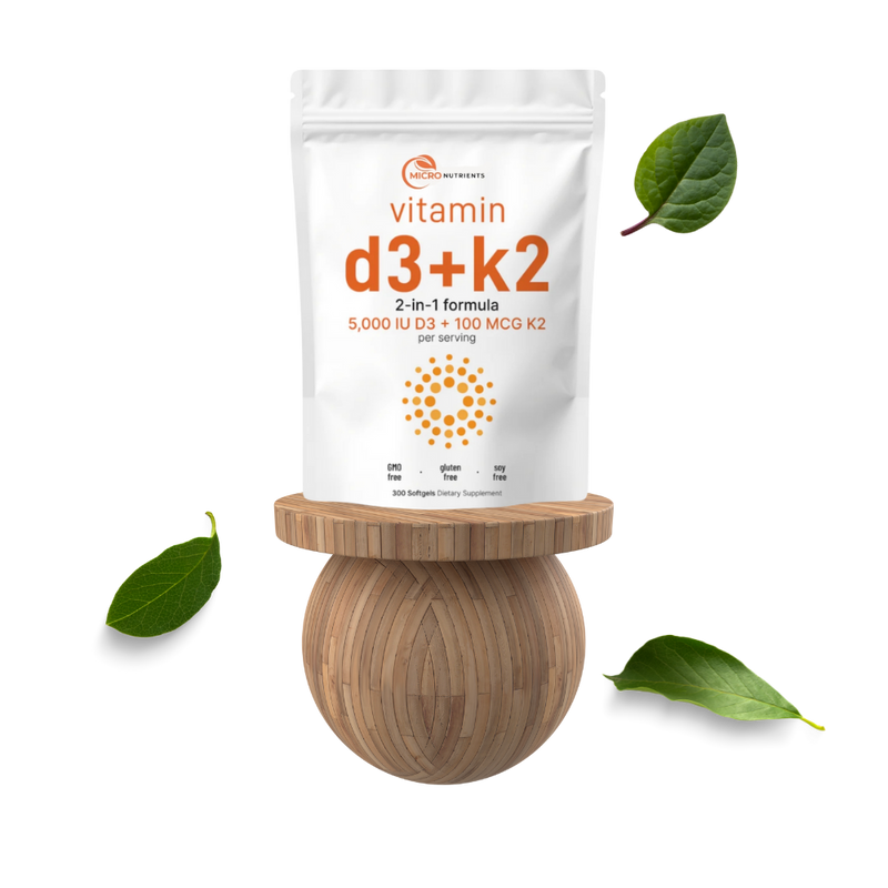 Vitamin D3+K2 supplement on a wooden stand with green leaves on a white background