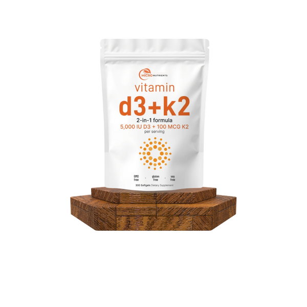 Vitamin D3 + K2 supplement on a wooden stand with a white background